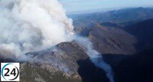 Bomberos de la BRIF de Lubia son rescatados ante el incendio en Peñalba de la Sierra.